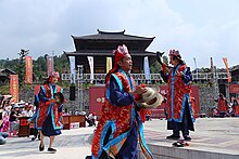 Nuo priests performing ritual at Chiyou Nuo Temple in Xinhua, Hunan.jpg