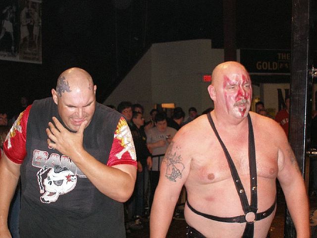 One Man Gang (left) and Smash at Chikara's King of Trios 2008