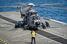 EC725 of the Brazilian Navy aboard helicopter carrier Atlantico, 2021 Operacao Poseidon (51443464716).jpg