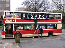 Respect campaigners decorating a bus in Manchester for the 2005 elections RESPECT Bus manchester.jpg