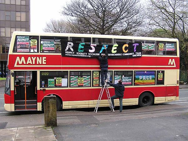 Respect campaigners decorating a bus in Manchester for the 2005 elections