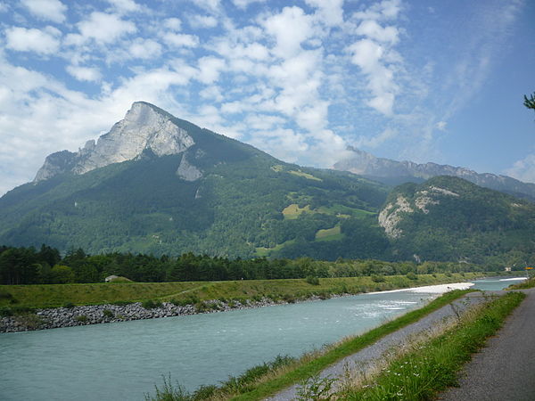 The Rhine between Sargans in Switzerland (left) and Balzers in Liechtenstein (right) with the Gonzen (1,829 m (6,001 ft), left), the Girrenspitz (2,09
