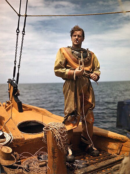 File:Sponge diver John M. Gonatos putting on his diving suit.jpg