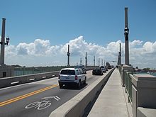 Shared Lane Marking, called a Sharrow, which has a similar function to the message shown above St Aug FL Bridge of Lions east end02.jpg