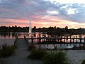 Sunset at Waterways Lake, viewed from the main pier on the north shore near Waterways Boulevard