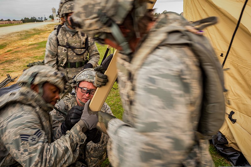 File:U.S. Air Force Maj. John Funke, center, a clinical nurse with the 81st Medical Group, and fellow team members put up a tent at Fort Polk, La., March 14, 2014, during Joint Readiness Training Center (JRTC) 14-05 140314-F-XL333-405.jpg