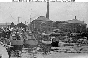 USS Apache is at left in this row of section patrol boats at the Boston Navy Yard, Boston, Massachusetts, probably soon after her commissioning. USS Apache (SP-729) at left.jpg