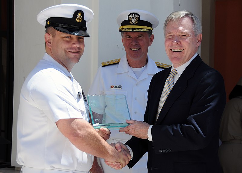 File:US Navy 100601-N-1512O-065 Secretary of the Navy (SECNAV) the Honorable Ray Mabus, right, presents the Enlisted Public Affairs Officer of the Year award to Chief Mass Communication Specialist Jason Morris.jpg