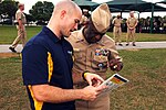 Miniatuur voor Bestand:US Navy 111114-N-MF541-267 Rear Adm. Earl L. Gay, commander of Navy Recruiting Command, is shown information about pillar prep, a component of the.jpg