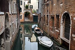 Street scene by a canal. Venice, Italy 2009