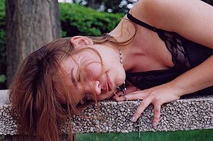 Young Woman Wearing a Rosary