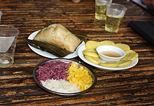 Assorted Zhuang snacks, incl. colored sticky rice and Zhuang style zongzi. Zhuang cuisine.jpg