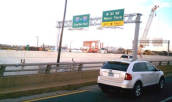 Signage on the new inbound span of the 11th Street Bridges shows the connection with I-695, which will be marked for the first time in its history. 11th Street Bridges Washington DC - 2011-12-16.jpg