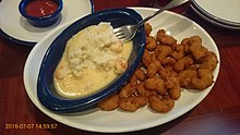 Popcorn shrimp on the right half of the plate 2016-07-07. Red Lobster. (27653546223).jpg