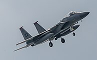 A US Air Force F-15C Eagle, tail number 85-0115, on final approach at Kadena Air Base in Okinawa, Japan