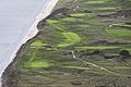 Aerial view of 14th, 15th and 16th holes at Portmarnock Golf Club, Ireland.jpg