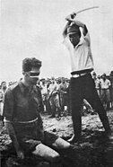 An Australian POW, Sgt Leonard Stiffleet, captured in New Guinea, about to be beheaded by a Japanese soldier with a guntō sword, 1943