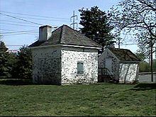 Block House, facing southeast, April 2006 (the smaller building in front is a spring house) Block house02.jpg