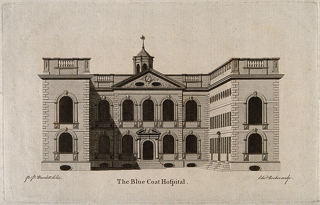 An engraving of the original school in the city centre