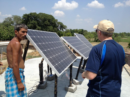 Brad Mattson installing solar panels in an off-grid Indian village, June 2013 .png