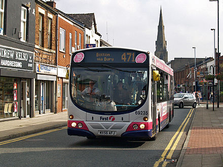 A First Greater Manchester bus in central Heywood. Public transport in Heywood is co-ordinated by Transport for Greater Manchester.