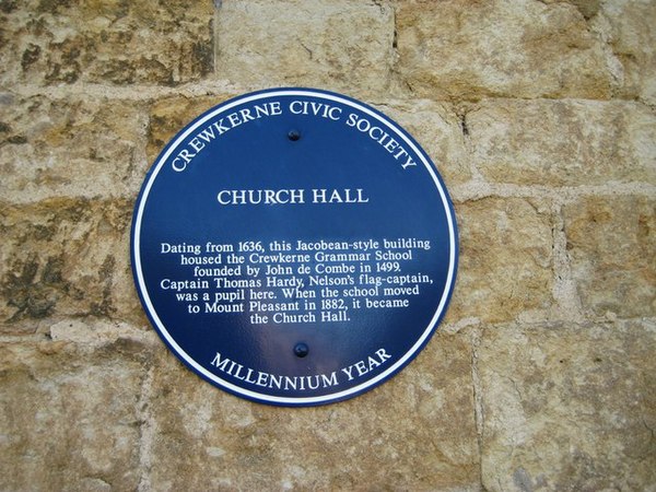 Blue plaque commemorating the former use of the Church Hall at Crewkerne as Crewkerne Grammar School where Hardy was a pupil