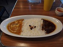 A combination meal with chicken curry, rice and beef curry Combination plate with chicken and beef curry, with rice.jpg