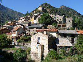 Kostel Sainte-Marguerite v Nabilles a okolní budovy v Conatu