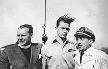 John Stanley Grauel, Yaakov Oron (Garbash) and Aryeh Kolomeitzev (later Kole) aboard President Warfield before she sailed to Europe Crew on the President Warfield (later the Exodus 1947) before its departure for Europe.jpg