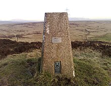 The Crow Knowl triangulation station at Crompton Moor in the South Pennines. It is one of the concrete pillars erected by the Ordnance Survey during the retriangulation of Great Britain. It was possible (in clear weather) to see at least two other trig points from any one trig point. Crompton Moor Trig Point (1).jpg