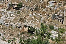 Rock-cut tombs in the necropolis of Cyrene. Cyrene (59) (8289473930).jpg