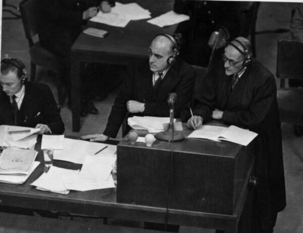 Sir David Maxwell Fyfe (centre) and an unknown prosecutor at the Nuremberg trials
