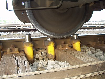 Smaller local hydraulic "dowty retarders" finesse the speed of a car being sorted as it approaches a switch or the new consists to which it is being joined.