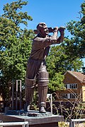 Statue of Eric Bedser batting