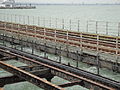 A high tide, seen at Ryde Pier, Ryde, Isle of Wight. In cases like this, waves often cover the railway track, meaning Island Line trains have to terminate at Ryde Esplanade railway station, and are not able to travel to Ryde Pier Head railway station.