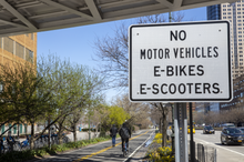 "NO MOTOR VEHICLES E-BIKES E-SCOOTERS" sign posted on the Hudson River Greenway in New York City Hudson-River-Greenway-EV-Sign.png