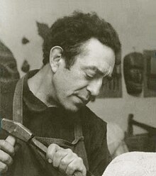 Jacob Lipkin carving stone,circa1959.jpg