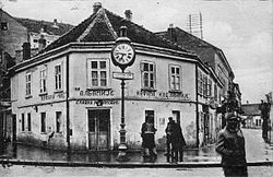 Kafana "Kod Albanije", with the first public clock in Belgrade. Today location of the Palace Albanija Kafana kod Albanije.JPG