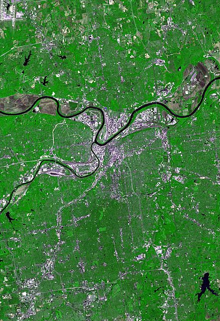 Kansas City satellite map. The larger Missouri River is zigzagging from west to east; the much smaller Kansas is approaching from the southwest and joins it at Kaw Point in Kansas City, Kansas. Downtown Kansas City, Missouri, is immediately southeast of their intersection and North Kansas City, Missouri, is to its northeast.