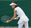 Kimiko Date-Krumm competing in the first round of the 2015 Wimbledon Qualifying Tournament at the Bank of England Sports Grounds in Roehampton, England. The winners of three rounds of competition qualify for the main draw of Wimbledon the following week.