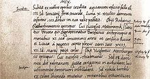 Ausschnitt aus einem handschriftlichen Manuskript in Latein mit Randnotizen und einem eingerahmten Satz.