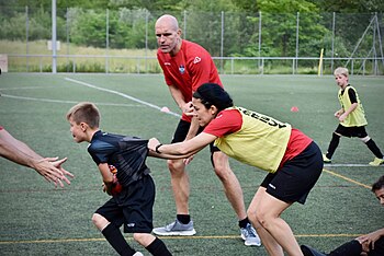 Tramontin coaching rugby, 2019 Luca Tramontin and Daniela Scalia coaching with rugby techniques FC Lugano Settore Giovanile.jpg