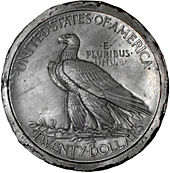 A metal model for the double eagle by Saint-Gaudens; the design was adapted for the eagle Metal double eagle sketch cutout.jpg