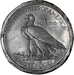 A metal model for the double eagle by Saint-Gaudens; the design was adapted for the eagle Metal double eagle sketch cutout.jpg