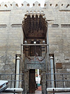 Entrance portal with flat muqarnas canopy at the Mosque of Amir Ulmas al-Hajib (1330)