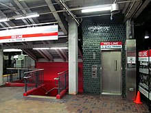 The Red Line elevator from the westbound Green Line platform New Park Street elevator December 2012.JPG