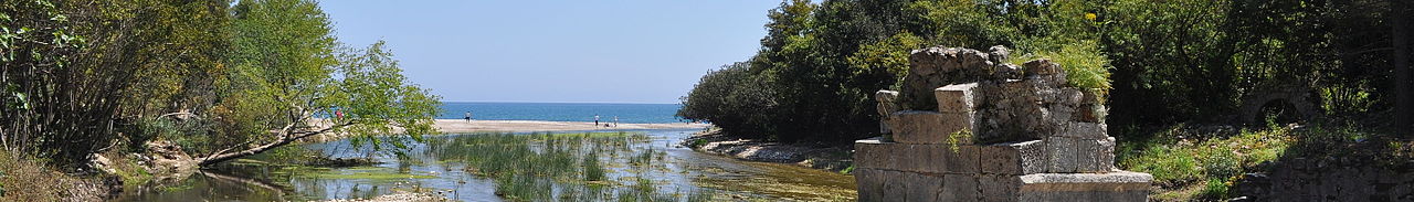 caption=Looking towards the sea along the creek that bisects the ancient city