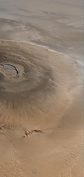 Olympus Mons (Latin, "Mount Olympus"), located on the planet Mars, is the tallest known mountain in the Solar System. Olympus Mons.jpeg