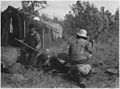 Paul Buffalo and wife parching wild rice at their camp - NARA - 285212.jpg