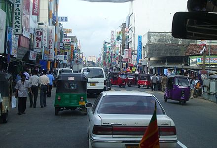 Thishaws and cars in the Petah district of Colombo